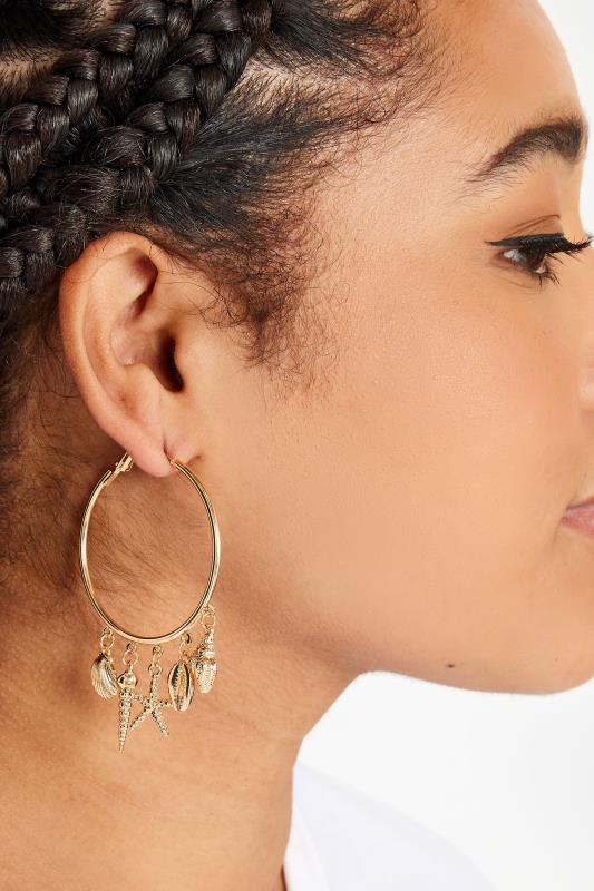 evans Yours Gold Tone Starfish Charm Hoop Earrings