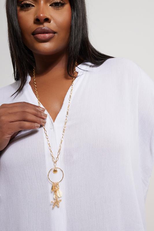 evans Yours Gold Tone Shell & Starfish Pendant Long Necklace